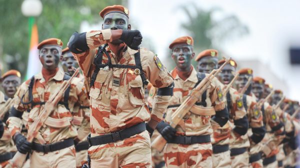 The members of Ivory Coast's special forces march, on August 7, 2013, at the presidential palace in Abidjan during celebrations marking the 53nd anniversairy of the country's independence from France. AFP PHOTO / ISSOUF SANOGOISSOUF SANOGO/AFP/Getty Images