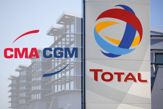 View of the logo of French oil giant Total in front of the oil refinery of Donges